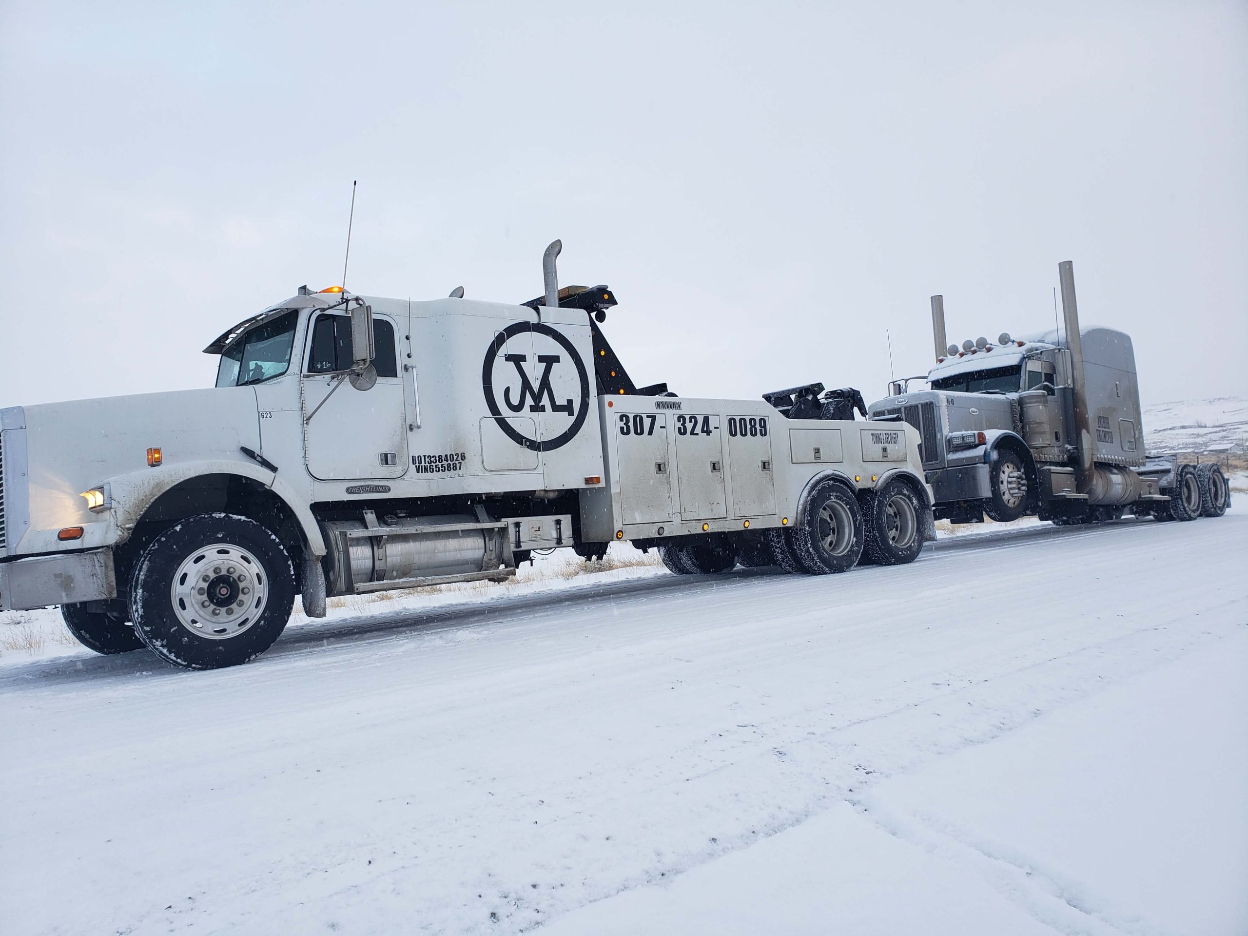 M Towing and Fleet Services logo